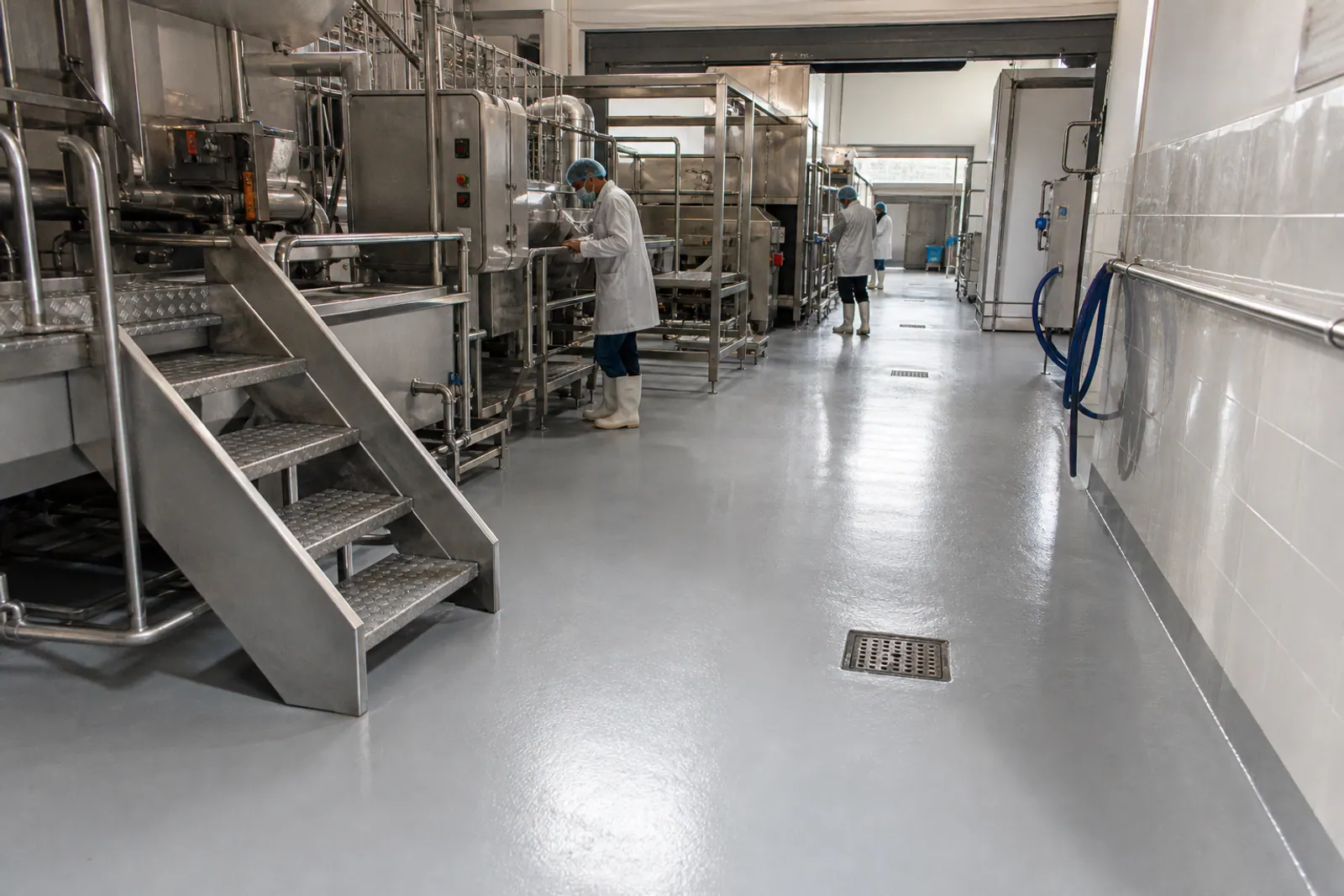 Finished epoxy floor in an industrial production area.