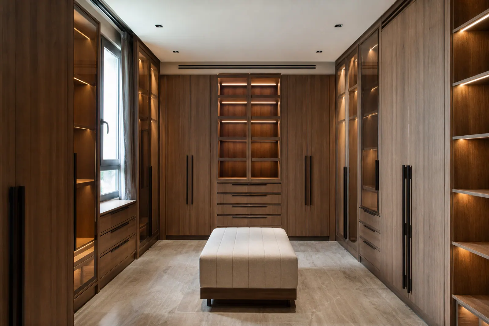 Custom fitted dressing-room cabinetry.